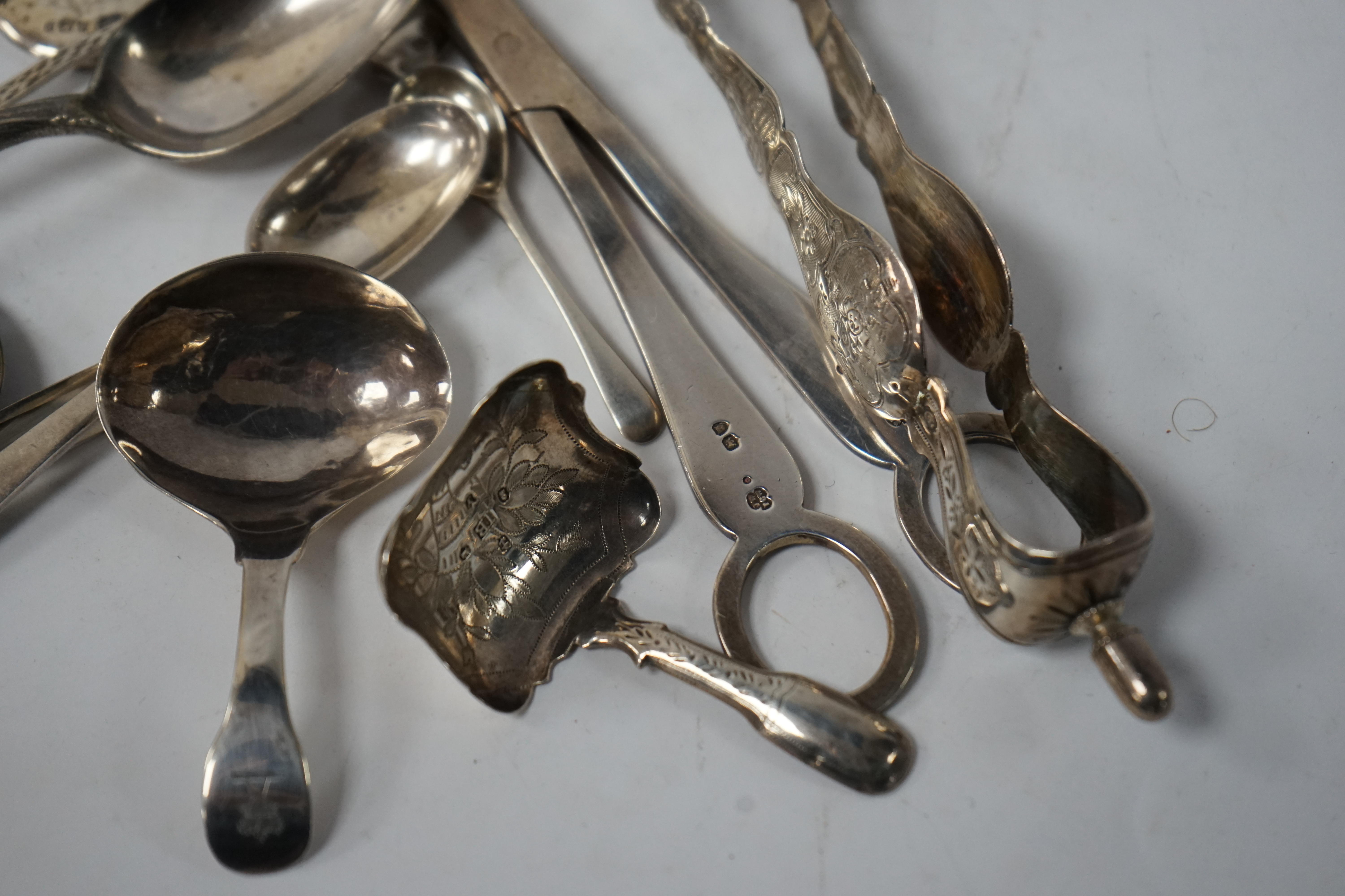 Assorted small silver and other white metal items including fruit knives, a pair of Georgian sugar nips, by Henry Plumpton, circa 1750, a pair of Victorian grape shears, Wakely & Wheeler, London 1887, pepperette, a Georg